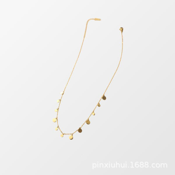 Naiste kuldne ripatsidega kaelakee