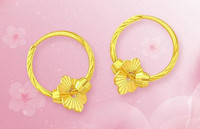 Γυναικεία σκουλαρίκια σε χρυσό χρώμα και λουλούδια
