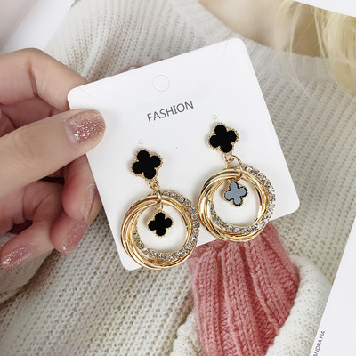 Naiste rippuvad kividega kõrvarõngad - mitu mudelit