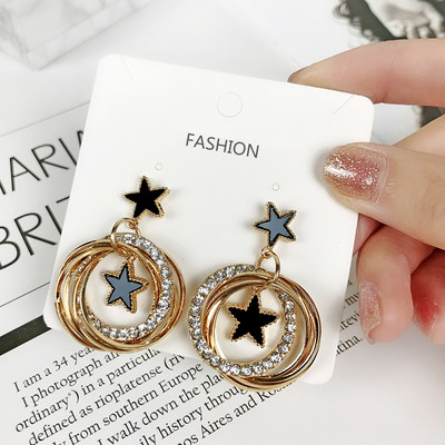 Naiste rippuvad kividega kõrvarõngad - mitu mudelit