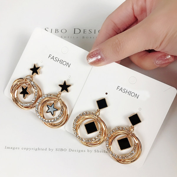 Naiste rippuvad kividega kõrvarõngad - mitu mudelit