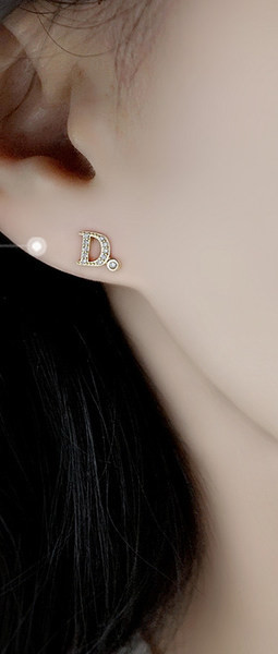 Moodsad naiste kividega kõrvarõngad - kuldset ja hõbedast värvi