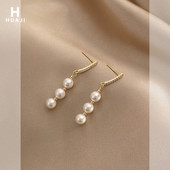 Rippuvad pärlitega kõrvarõngad