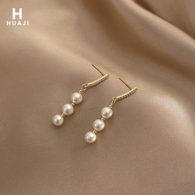 Rippuvad pärlitega kõrvarõngad