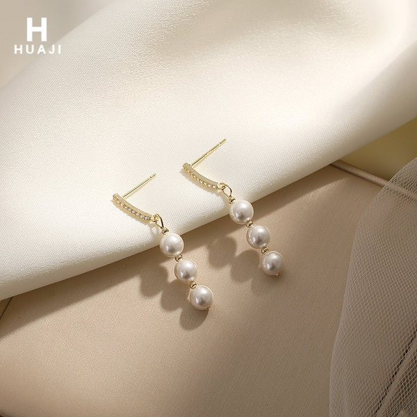 Rippuvad pärlitega kõrvarõngad