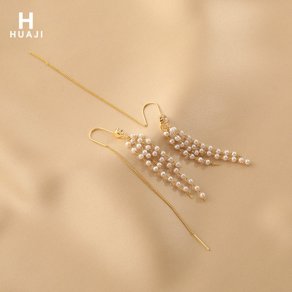 Moodsad naiste rippuvad pärlitega kõrvarõngad - kuldset värvi