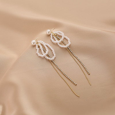Γυναικεία κρεμαστά σκουλαρίκια με πέτρες και πέρλες