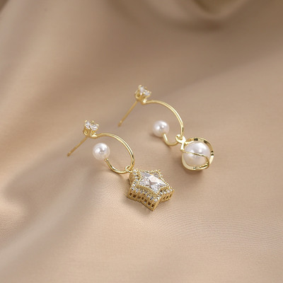 Γυναικεία σκουλαρίκια με πέρλες και πέτρες