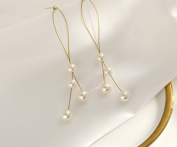 Naiste stiilsed pärliripatsiga kõrvarõngad uus mudel