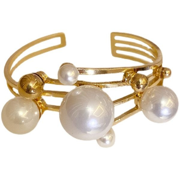Μοντέρνο γυναικείο βραχιόλι με διακόσμηση με πέρλες