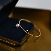 Μοντέρνο γυναικείο χρυσό βραχιόλι με πέρλα