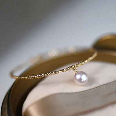 Μοντέρνο γυναικείο χρυσό βραχιόλι με πέρλα