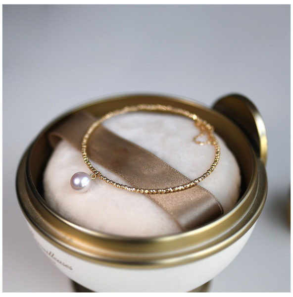 Μοντέρνο γυναικείο χρυσό βραχιόλι με πέρλα