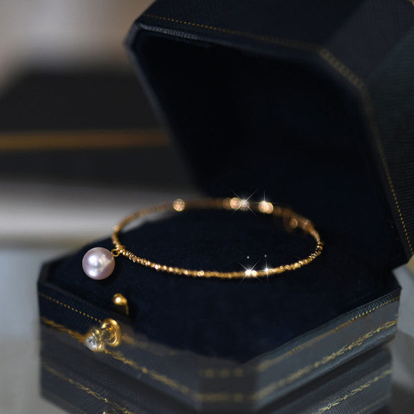 Μοντέρνο γυναικείο χρυσό βραχιόλι με πέρλα