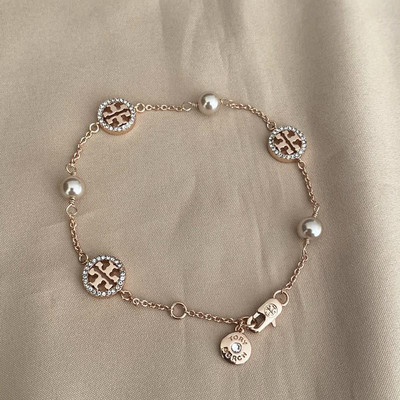 Μοντέρνο γυναικείο βραχιόλι σε τρία χρώματα με διακοσμητικές πέτρες