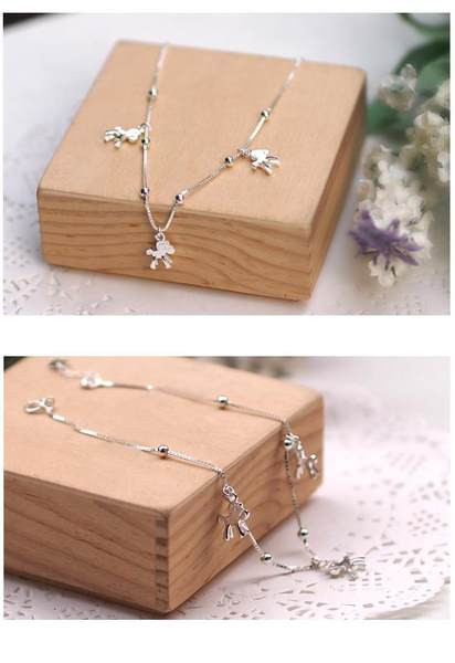 Ασημένιο χρώμα γυναικείο βραχιόλι με μενταγιόν