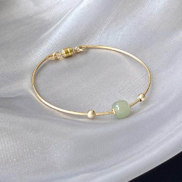 Στρογγυλό γυναικείο βραχιόλι με διακοσμητική πέτρα