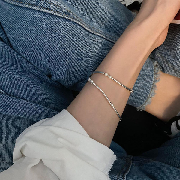 Ασημένιο χρώμα βραχιόλι με πέρλες