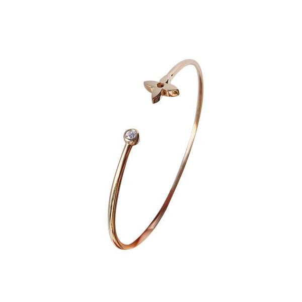 Neljalehelise ristikuga kaunistatud naiste käevõru