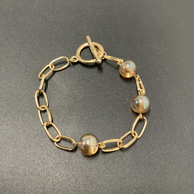 Μοντέρνο γυναικείο βραχιόλι με πέτρες-χρυσό χρώμα