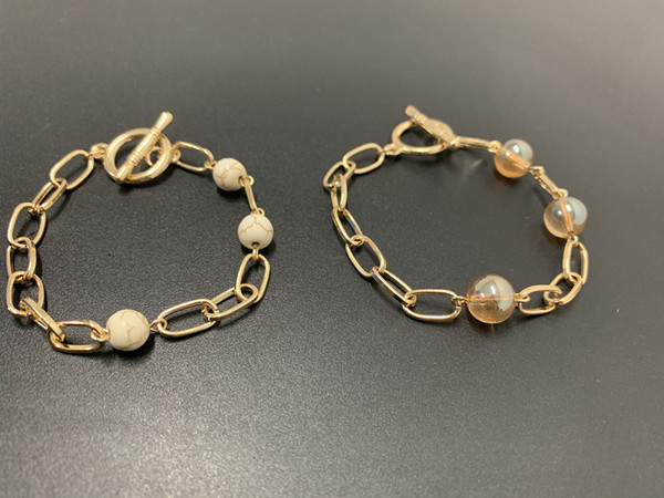 Μοντέρνο γυναικείο βραχιόλι με πέτρες-χρυσό χρώμα