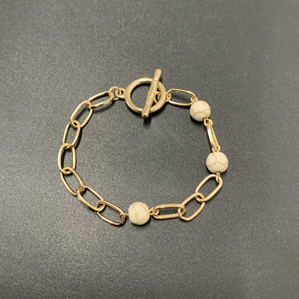 Μοντέρνο γυναικείο βραχιόλι με πέτρες-χρυσό χρώμα