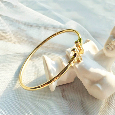 Μοντέρνο γυναικείο βολβό τύπου βραχιόλι - χρυσό και ασημί χρώμα