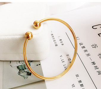 Γυναικείο χρυσό χρώμα  μπρασελέ τύπου φιάλη