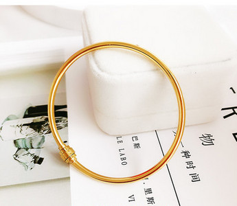 Γυναικείο χρυσό χρώμα  μπρασελέ τύπου φιάλη