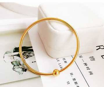 Γυναικείο χρυσό χρώμα  μπρασελέ τύπου φιάλη