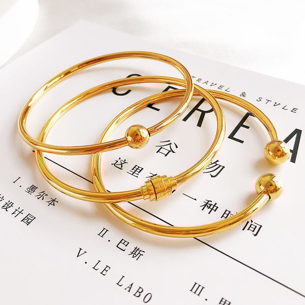 Γυναικείο χρυσό χρώμα  μπρασελέ τύπου φιάλη