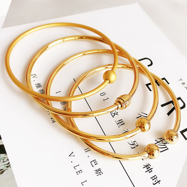 Γυναικείο χρυσό χρώμα  μπρασελέ τύπου φιάλη