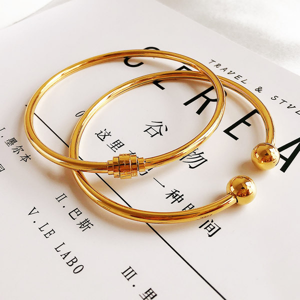 Γυναικείο χρυσό χρώμα  μπρασελέ τύπου φιάλη