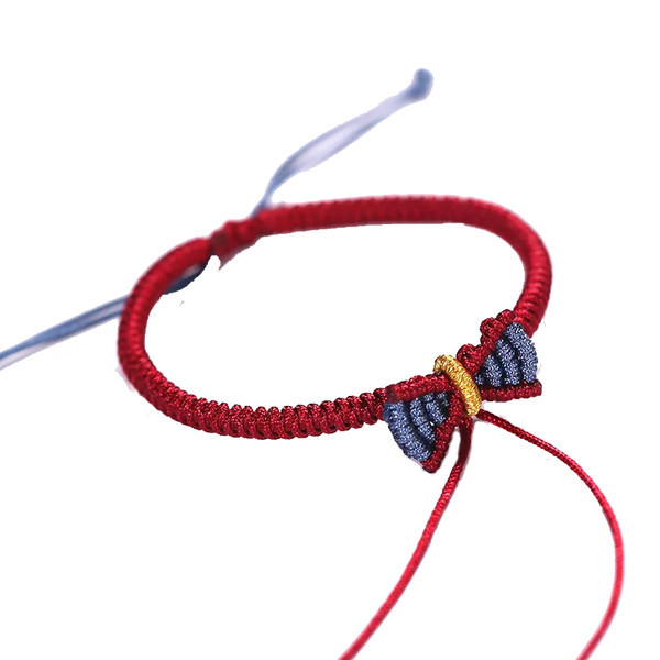 Naiste tekstiilist käevõru paelaga