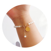 Βραχιόλι με πέρλες με διαφορετικά μενταγιόν