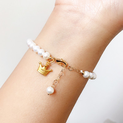 Βραχιόλι με πέρλες με διαφορετικά μενταγιόν