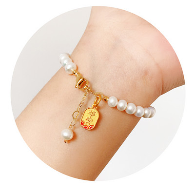 Βραχιόλι με πέρλες με διαφορετικά μενταγιόν