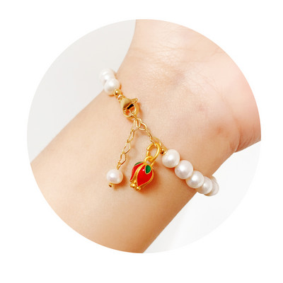 Βραχιόλι με πέρλες με διαφορετικά μενταγιόν