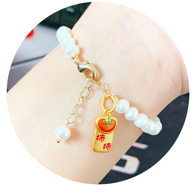 Βραχιόλι με πέρλες με διαφορετικά μενταγιόν