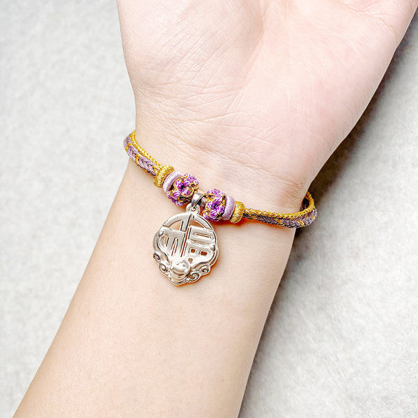 Ženska narukvica s vezama