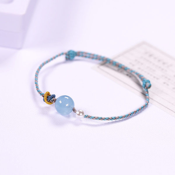 Spalvota tekstilinė apyrankė