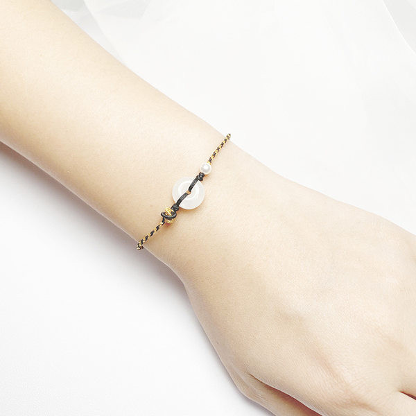 Spalvota tekstilinė apyrankė