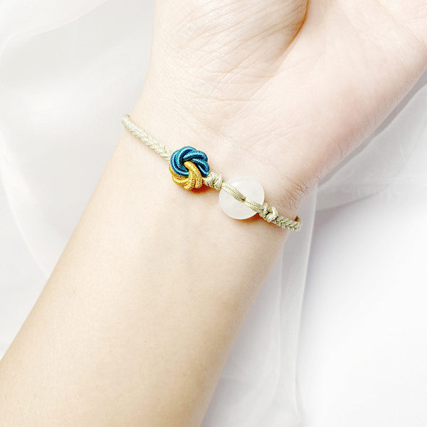 Ženska tekstilna narukvica sa čvorovima novi model