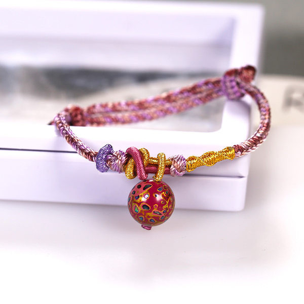 Ženska tekstilna narukvica s vezicama