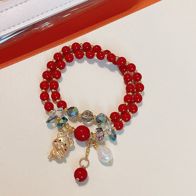 Γυναικείο βραχιόλι με χάντρες και μενταγιόν