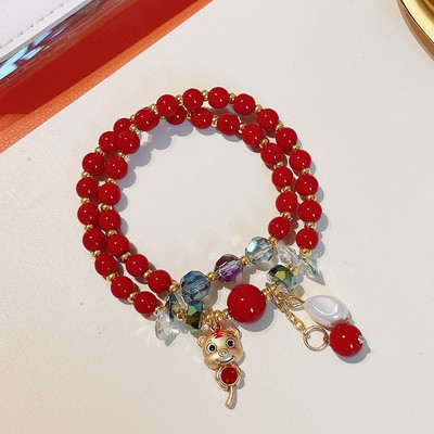 Γυναικείο βραχιόλι με χάντρες και μενταγιόν