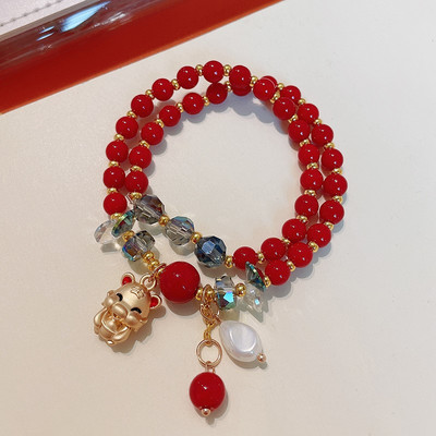 Γυναικείο βραχιόλι με χάντρες και μενταγιόν