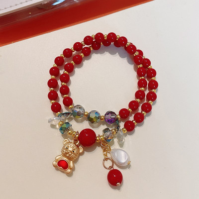 Γυναικείο βραχιόλι με χάντρες και μενταγιόν
