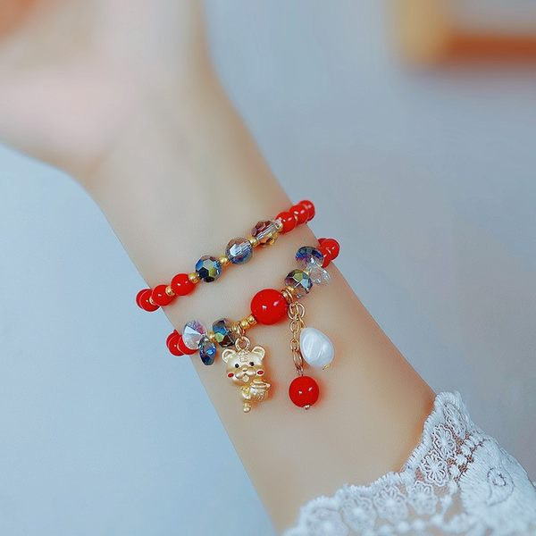 Γυναικείο βραχιόλι με χάντρες και μενταγιόν