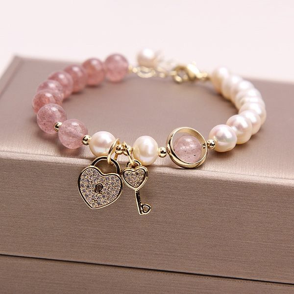 Ženska narukvica sa perlama i privjeskom novi model